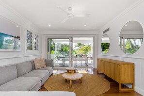 Casual downstairs lounge area off pool deck