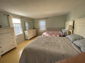guest bedroom with 2 double beds