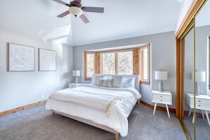 Comfy main bedroom with a king