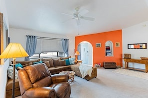 Our spacious living room, with plenty of comfortable seating for everyone.