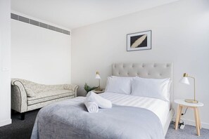 3rd Bedroom on the 3rd Floor: The sunlit bedroom offers a queen bed and storage space for your belongings