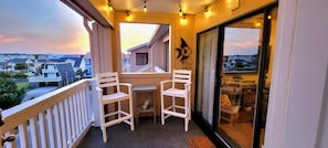 Covered Porch with Lights and Ocean View.