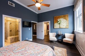 This primary suite enjoys a stunning primary bathroom as well as large walk-in closet. 