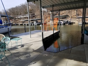 Two well boat dock with jumping platform, paddle boat, and stand-up paddle board