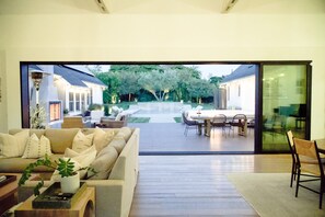 26 ft wide custom La Cantina sliders for maximum indoor/outdoor living