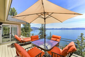 Outdoor upper deck with lake & mountain view