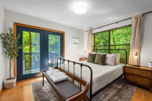 Thoughtfully designed Left Guest Retreat Bedroom w/ French doors