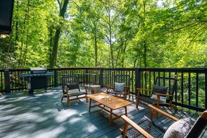 BBQ outside with friends & family while taking in amazing forest views