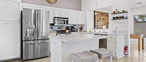 Remodeled kitchen with stainless steel appliances