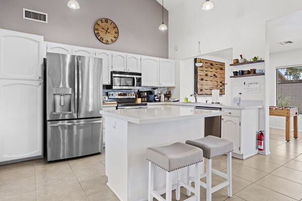 Remodeled kitchen with stainless steel appliances