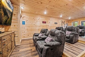 Theater room, 9 seats that recline for hours of comfort and relaxation!