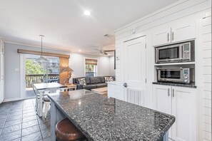 interior - View from kitchen overlooking dining and living areas