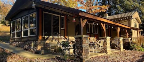 Rustic lakefront cabin  with covered patio, hot tub and plenty of space to relax