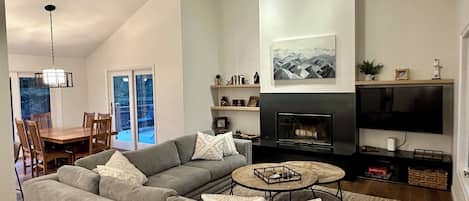 Cozy living room with large, comfy sectional and new  50 inch tv. 