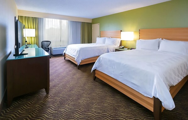 Room with 2 Double Beds. Exact unit will be assigned upon arrival. Views, colors and decor may vary.