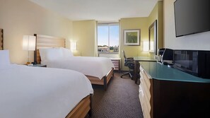 Room with 2 Double Beds. Exact unit will be assigned upon arrival. Views, colors and decor may vary.