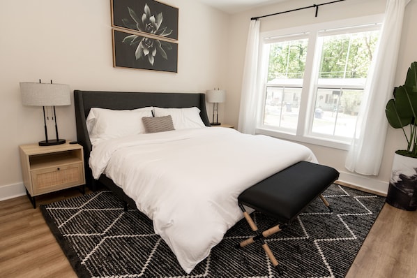 King Suite #2 - Located on the lower level, king bed, private bath, smart TV