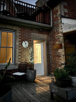 Enter the Victorian through the back door on the back deck beside the driveway.