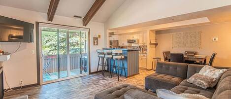 Relax and unwind in this inviting living area with a fireplace and plenty of seating.