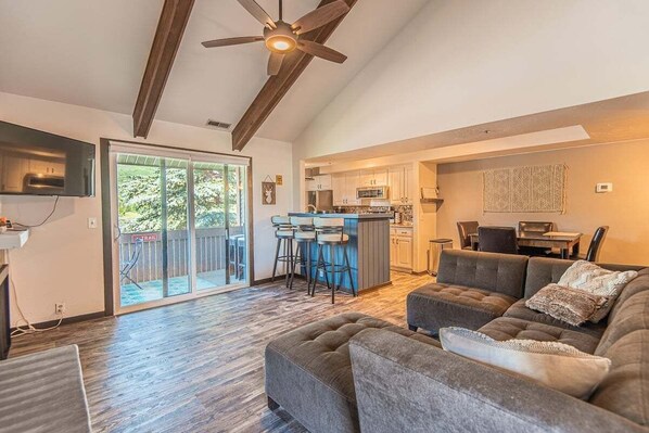 Relax and unwind in this inviting living area with a fireplace and plenty of seating.