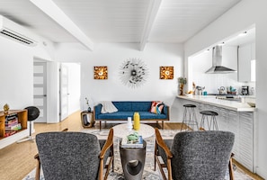 Unwind in our mid-century living room with era-inspired design.