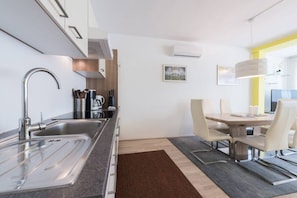 Full equipped kitchen for you to enjoy a bit of cooking fun during your stay!
