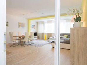 Spacious living room with lots of seating and relaxing area.