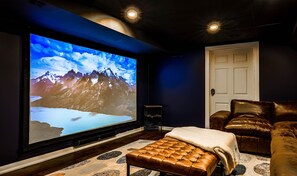 Theatre Room- 120" projection screen that covers the whole wall, speakers that make the action come alive, and huge comfy sectional for the whole crew.  Grab a bag of popcorn and get lost in the Movie Experience!