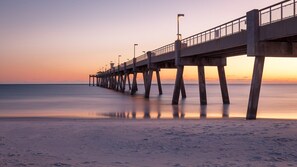 Stroll along the Island Fishing Pier and enjoy breathtaking sunset views over the water.