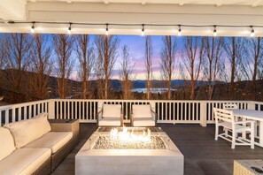 Main level deck with firepit & outdoor dining