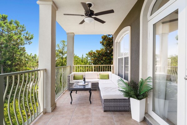 Relax on the Covered Balcony at Seagrove Stillhouse!