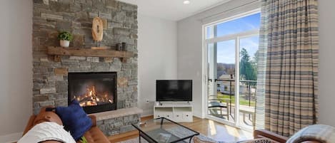 Cozy living room with gas fireplace.
