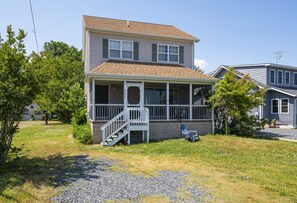 You may never want to leave this Screened Porch.