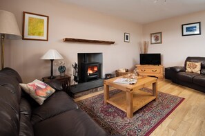 Sitting room with wood burning stove
