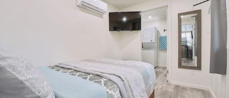 Bedroom with Full Sized Bed and Smart TV