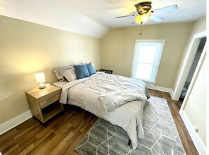 Second bedroom upstairs with a queen bed.