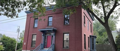 Antique sea captain's mansion, the accommodations are the entire 2nd and 3rd floors.  Off-street parking for 4 cars (small to mid-sized).