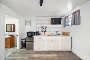 A well-stocked kitchen, equipped with all the essentials to prepare delightful meals for your group