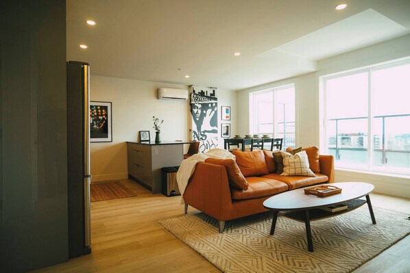Open concept living room/dining/kitchen