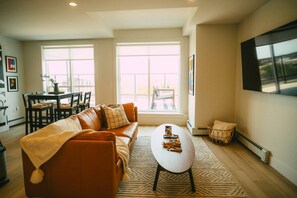 Open concept living room/dining/kitchen