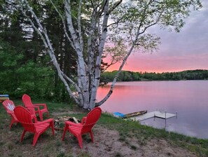 Full lake view from fire pit. Keep clear sight lines on people.