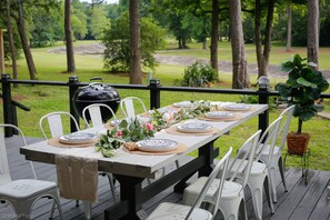 long beautiful outdoor dining table (with all dinnerware included)