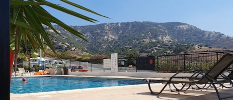 swimming pool with mountain views.