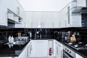 Indulge your culinary creativity in our fully equipped kitchen, boasting a fridge/freezer, hob and oven, kettle, toaster, washing machine/dryer, and all the essential kitchenware you'll need to prepare your meals.