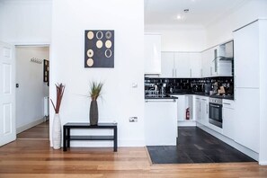 Indulge your culinary creativity in our fully equipped kitchen, boasting a fridge/freezer, hob and oven, kettle, toaster, washing machine/dryer, and all the essential kitchenware you'll need to prepare your meals.