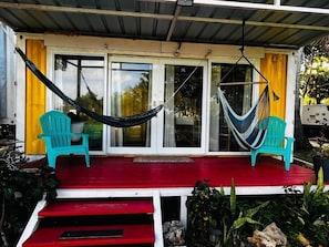 Porch with hammocks and beach chairs to enjoy with good company.