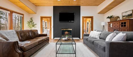 The fireplace and smart TV are a great place to gather and relax together at the end of a great day in northern Door County.