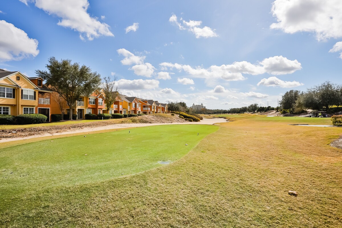 Inviting dog-friendly townhouse with pool, golf nearby, central AC, & W/D