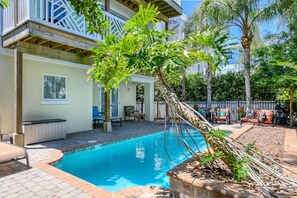 Enjoy this poolside experience with comfortable seating areas in a serene setting.