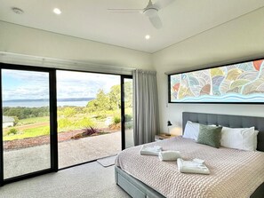 Bedroom 2 - King bed with its own sliding door access to the front deck and views.